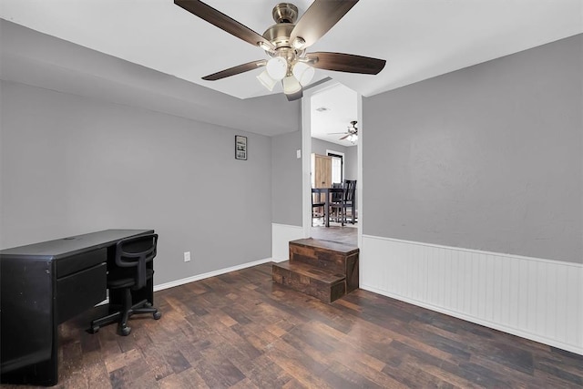 113 Central Dr, Sayre, OK 73662 - home office featuring wood finished floors, a ceiling fan, and a wainscoted wall