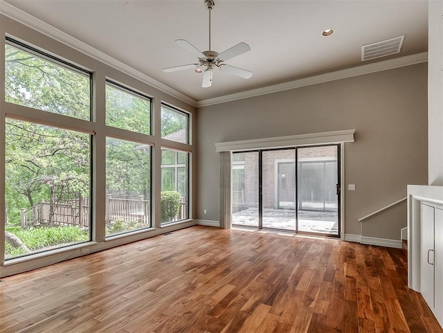 13504 Fox Creek Dr, Oklahoma City, OK 73131 - empty room featuring ceiling fan, wood finished floors, crown molding, and baseboards