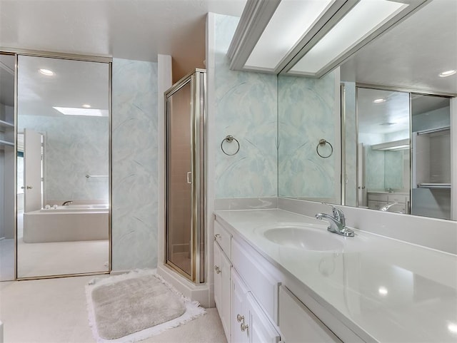 13504 Fox Creek Dr, Oklahoma City, OK 73131 - full bath with vanity, a garden tub, a shower stall, and recessed lighting