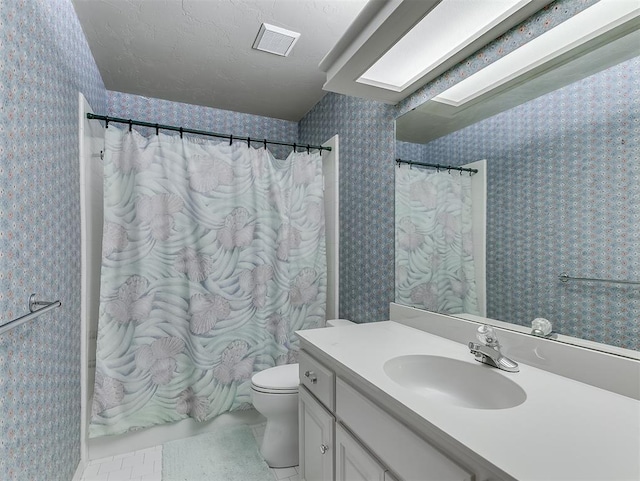 13504 Fox Creek Dr, Oklahoma City, OK 73131 - bathroom with wallpapered walls, vanity, toilet, and tile patterned floors