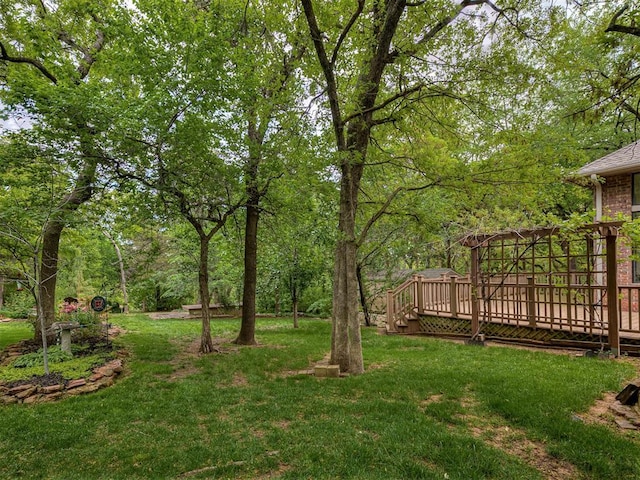 13504 Fox Creek Dr, Oklahoma City, OK 73131 - view of green lawn featuring a wooden deck