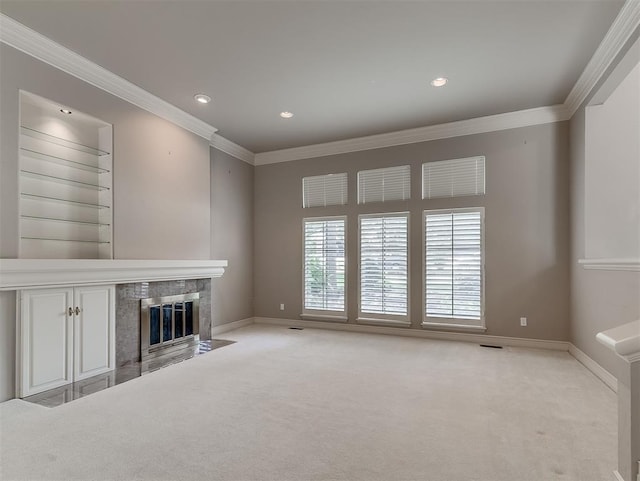 13504 Fox Creek Dr, Oklahoma City, OK 73131 - unfurnished living room with light carpet, crown molding, baseboards, a high end fireplace, and recessed lighting