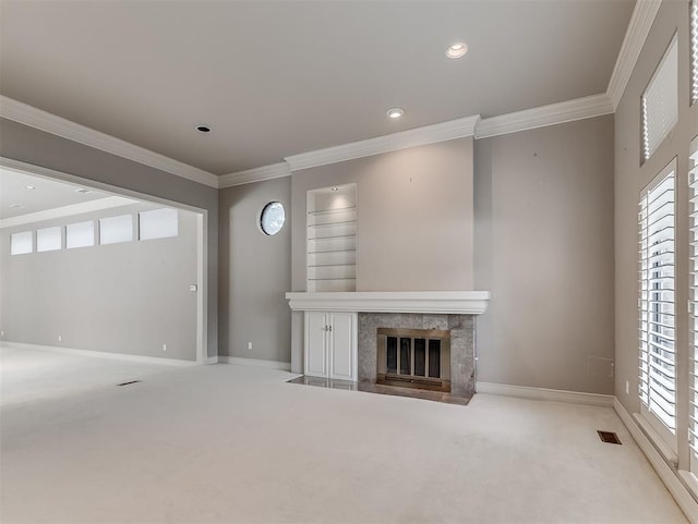 13504 Fox Creek Dr, Oklahoma City, OK 73131 - unfurnished living room with carpet, ornamental molding, baseboards, a premium fireplace, and recessed lighting