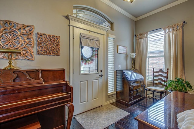 1904 Wheatfield Ave, Yukon, OK 73099 - foyer entrance featuring ornamental molding and dark wood finished floors