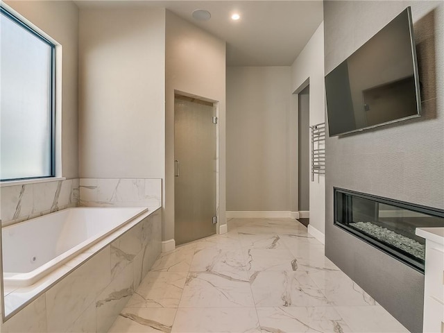6105 NW 147th Ter, Oklahoma City, OK 73142 - full bath featuring marble finish floor, a jetted tub, baseboards, recessed lighting, and a stall shower