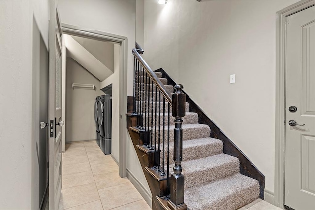 2828 Ryder Dr, Yukon, OK 73099 - staircase with tile patterned flooring and washing machine and clothes dryer