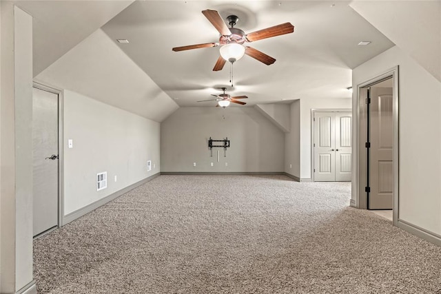 2828 Ryder Dr, Yukon, OK 73099 - bonus room with visible vents, a ceiling fan, carpet, and baseboards