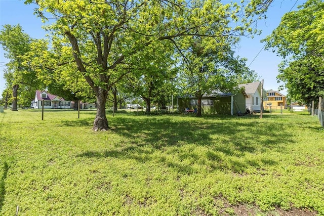 724 Maple St, Perry, OK 73077 - view of yard featuring fence