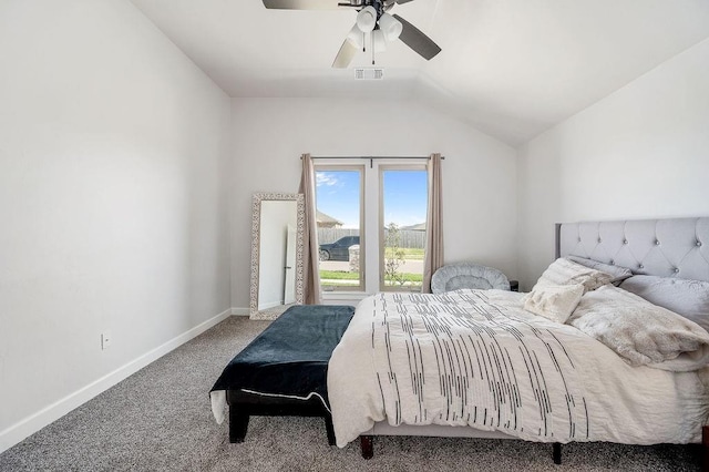 bedroom featuring lofted ceiling, visible vents, baseboards, carpet flooring, and ceiling fan