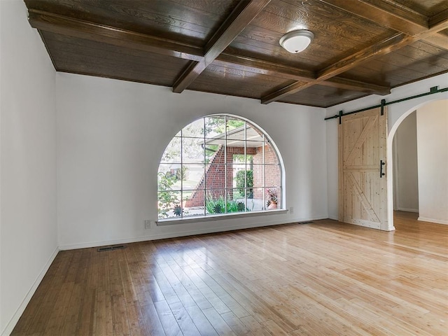 11609 Windmill Rd, Oklahoma City, OK 73162 - empty room with wooden ceiling, arched walkways, coffered ceiling, and a barn door