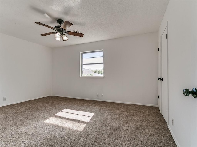 11609 Windmill Rd, Oklahoma City, OK 73162 - carpeted spare room featuring baseboards, a ceiling fan, and a textured ceiling