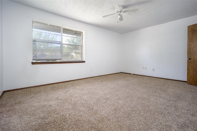 1906 NW 66th Cir, Lawton, OK 73505 - unfurnished room featuring baseboards, ceiling fan, carpet flooring, and a textured ceiling