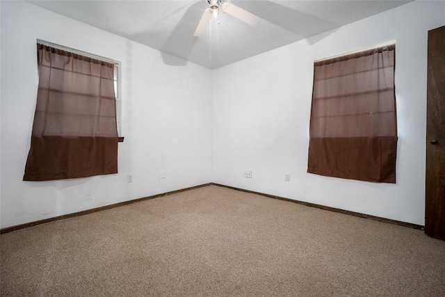 1906 NW 66th Cir, Lawton, OK 73505 - carpeted spare room featuring baseboards and ceiling fan