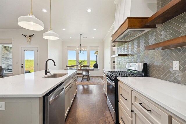 4162 Hawthorne St NW, Piedmont, OK 73078 - kitchen featuring stainless steel appliances, dark wood-style floors, light countertops, open shelves, and ornamental molding