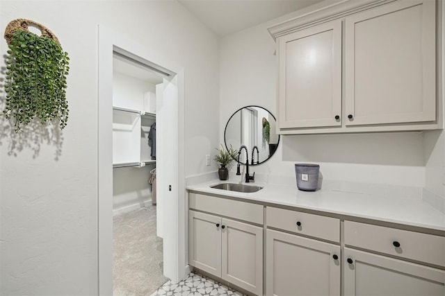 4162 Hawthorne St NW, Piedmont, OK 73078 - bar area featuring a sink and light flooring