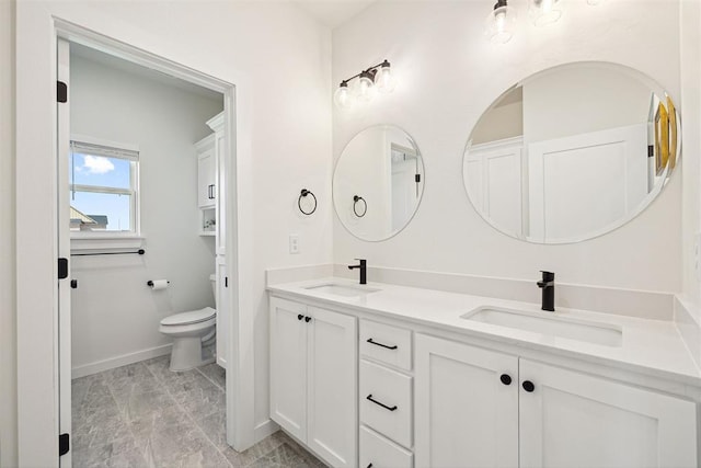 4162 Hawthorne St NW, Piedmont, OK 73078 - full bathroom featuring double vanity and toilet