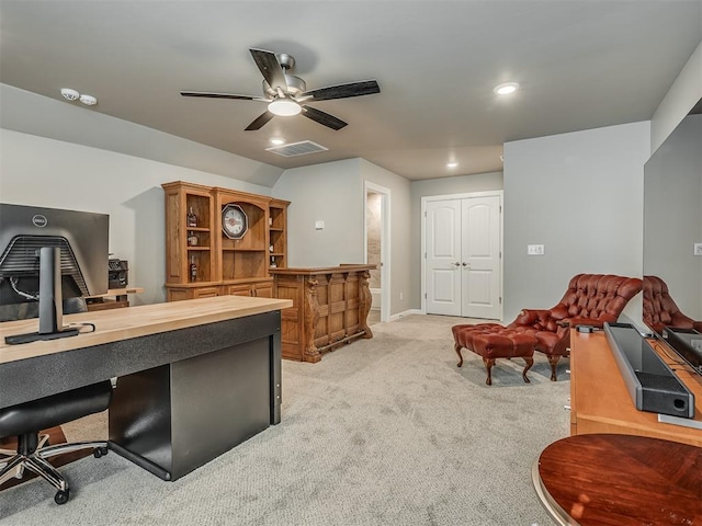home office featuring recessed lighting, visible vents, light carpet, baseboards, and ceiling fan