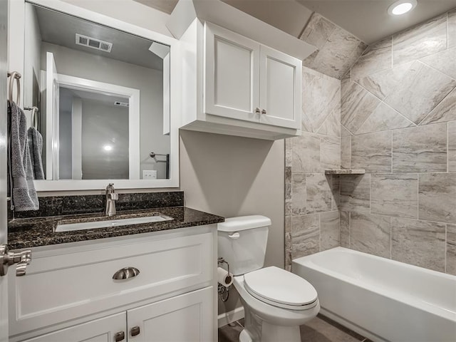 full bath with visible vents, toilet, vanity, and  shower combination