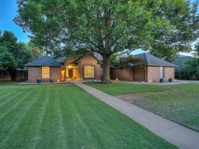 4216 Two Lakes Ave, Norman, OK 73072 - view of front of house featuring brick siding and roof with shingles