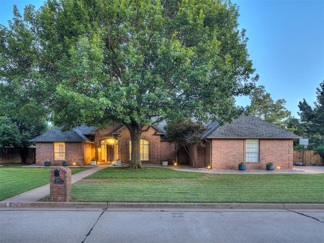 4216 Two Lakes Ave, Norman, OK 73072 - view of front of home featuring brick siding and a shingled roof