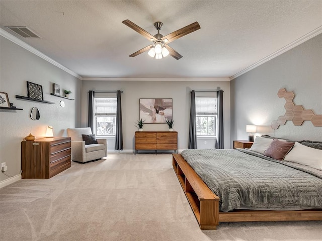 4216 Two Lakes Ave, Norman, OK 73072 - bedroom with multiple windows, light carpet, ornamental molding, a textured ceiling, and a ceiling fan