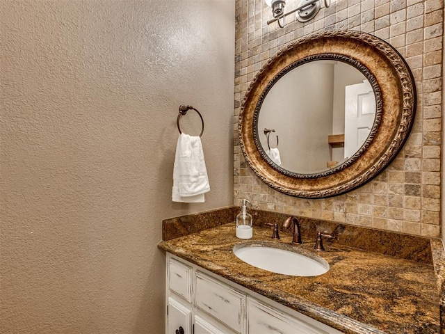 4216 Two Lakes Ave, Norman, OK 73072 - bathroom with a textured wall and vanity