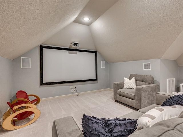 4216 Two Lakes Ave, Norman, OK 73072 - home theater featuring a textured ceiling, lofted ceiling, and carpet