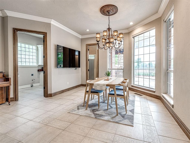 dining room featuring light tile patterned flooring, a notable chandelier, a textured ceiling, baseboards, and ornamental molding