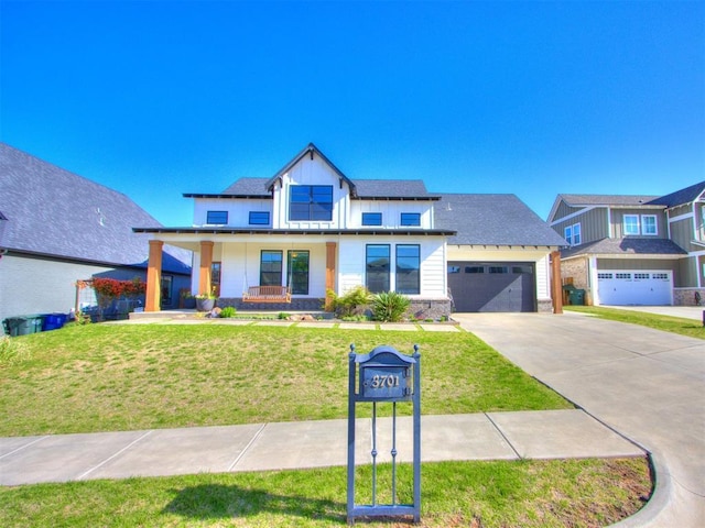 view of front of home featuring concrete driveway, board and batten siding, covered porch, a front yard, and roof with shingles