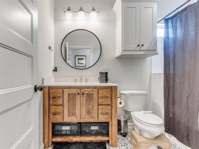 full bathroom featuring shower / bath combo, toilet, and vanity