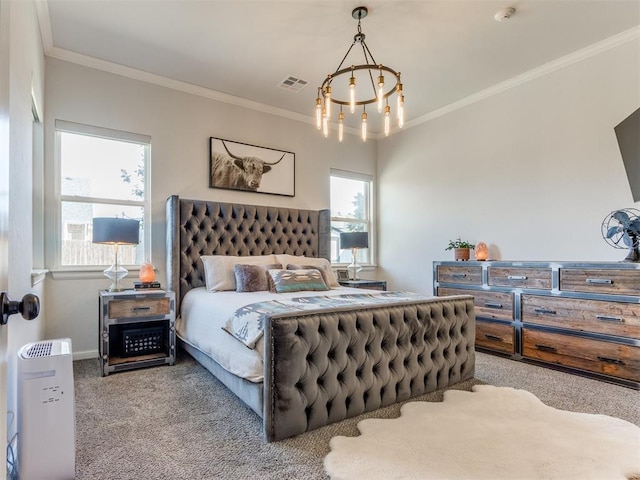 carpeted bedroom with visible vents, crown molding, baseboards, and a notable chandelier