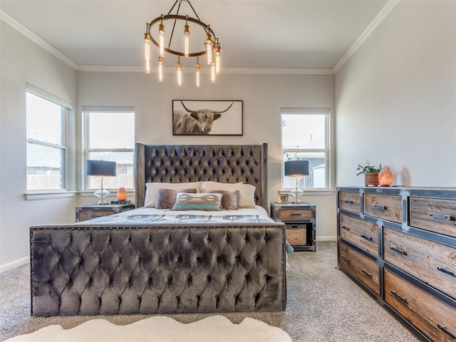 carpeted bedroom with a chandelier, baseboards, and ornamental molding