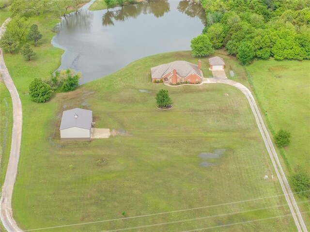 drone / aerial view with a water view