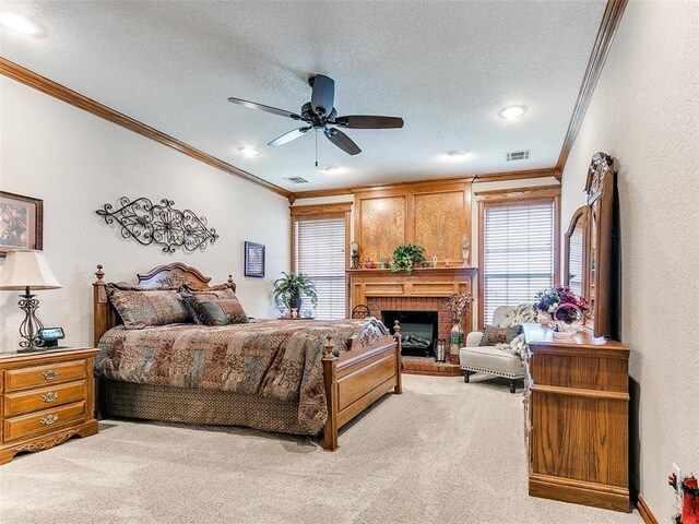 bedroom featuring crown molding, visible vents, multiple windows, and carpet