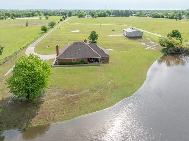 bird's eye view with a water view and a rural view