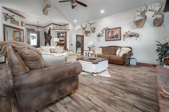 living area with a ceiling fan, baseboards, recessed lighting, wood finished floors, and lofted ceiling