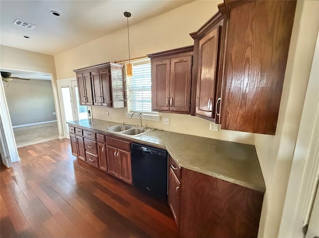 kitchen with dark wood-style floors, a sink, pendant lighting, black dishwasher, and visible vents