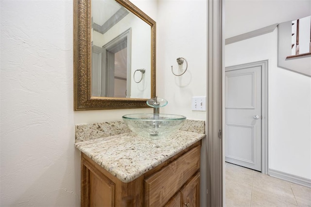 bathroom with vanity and tile patterned flooring