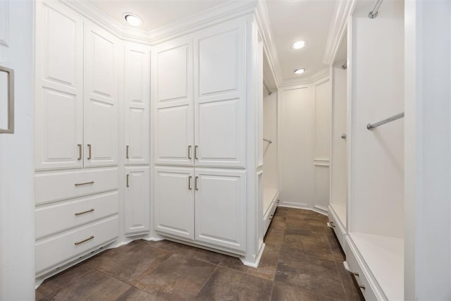 spacious closet with stone finish flooring