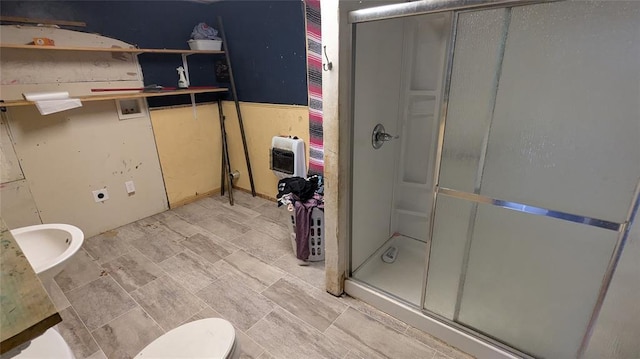 121 N High Ave, Shawnee, OK 74801 - full bath with vanity, toilet, heating unit, and a stall shower
