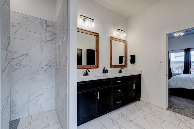 13513 NW 1st St, Yukon, OK 73099 - full bath with connected bathroom, a sink, marble finish floor, and double vanity