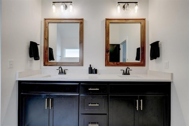13513 NW 1st St, Yukon, OK 73099 - bathroom featuring a sink and double vanity
