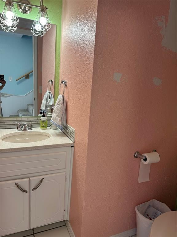 215 Justin Dr, Norman, OK 73071 - half bathroom with vanity and toilet