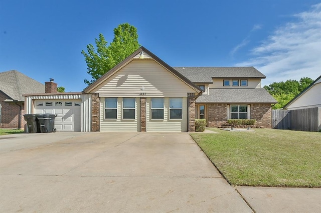 1637 NE 9th St, Moore, OK 73160 - view of front facade with fence, concrete driveway, an attached garage, brick siding, and a front yard