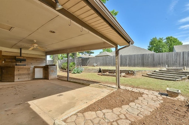 1637 NE 9th St, Moore, OK 73160 - view of patio with a ceiling fan and a fenced backyard
