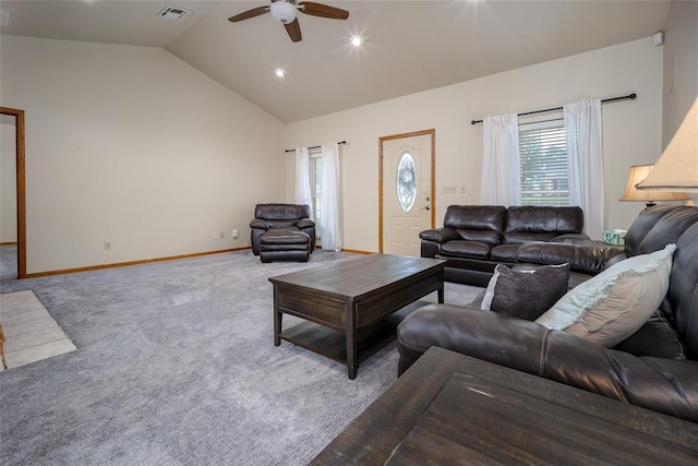 carpeted living area featuring visible vents, plenty of natural light, ceiling fan, and lofted ceiling