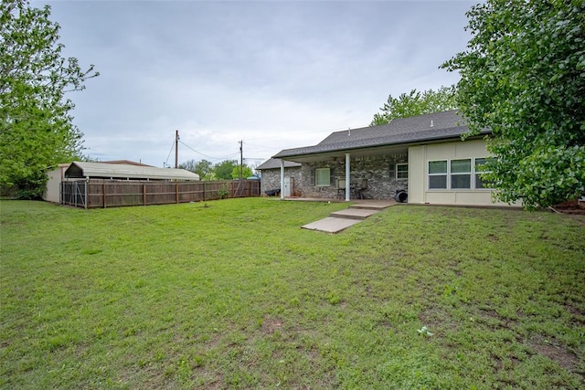 view of yard featuring fence