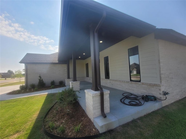 1124 NW 17 Th Pl, Newcastle, OK 73065 - view of side of home with a lawn and brick siding