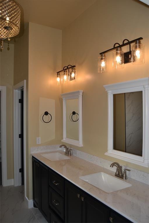 1124 NW 17 Th Pl, Newcastle, OK 73065 - bathroom featuring a sink, a chandelier, double vanity, and marble finish floor