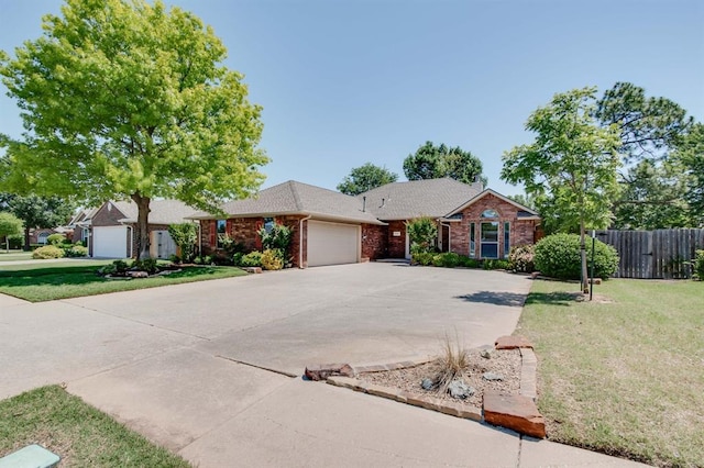 3505 Bright St, Norman, OK 73072 - ranch-style home featuring a garage, brick siding, and driveway